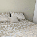queen bed with two closets